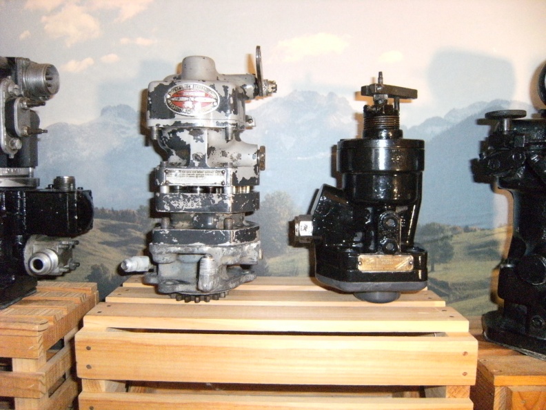 A Hamilton Standard propeller governor manufactured by Woodward and a Woodward type CSSA prop_ governor.JPG